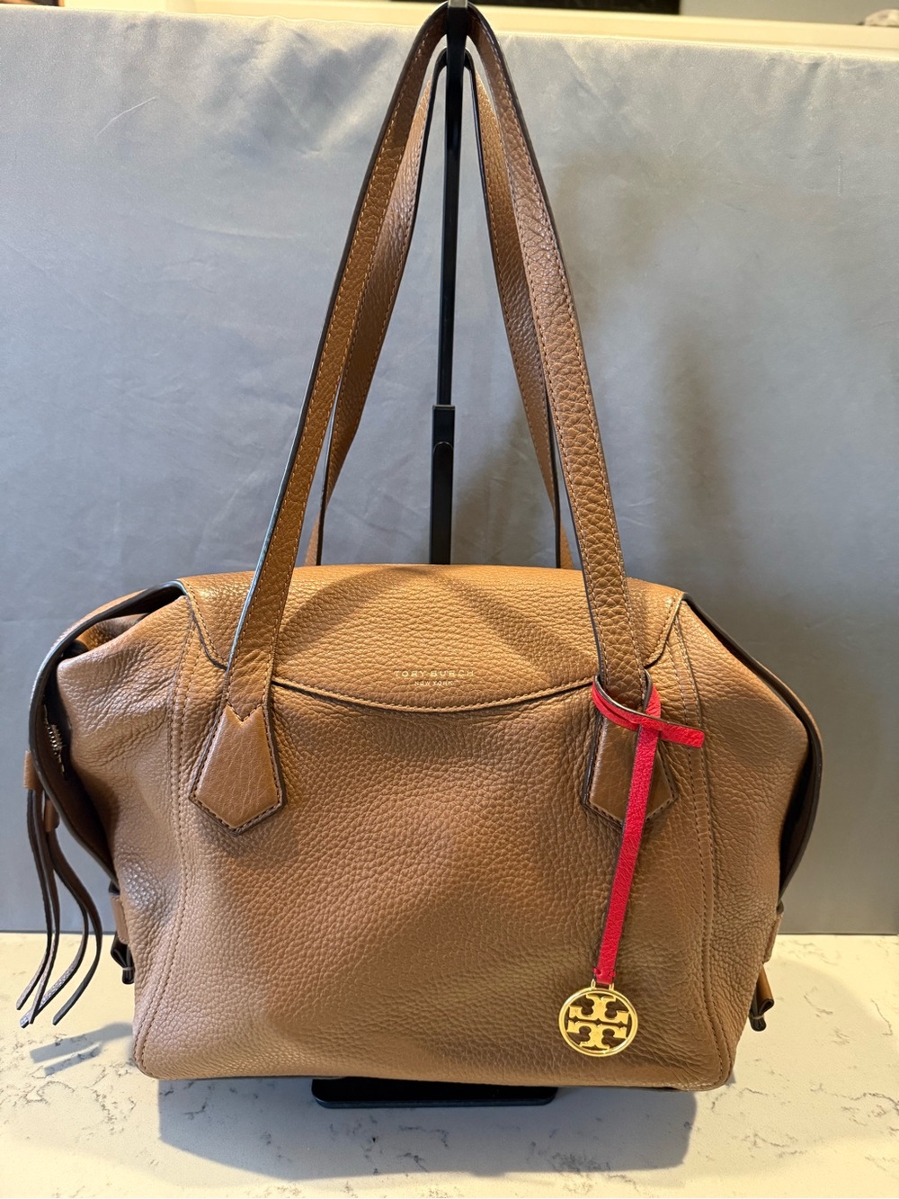 Tory Burch Tan Pebbled Leather Shoulder Bag with Red Charm